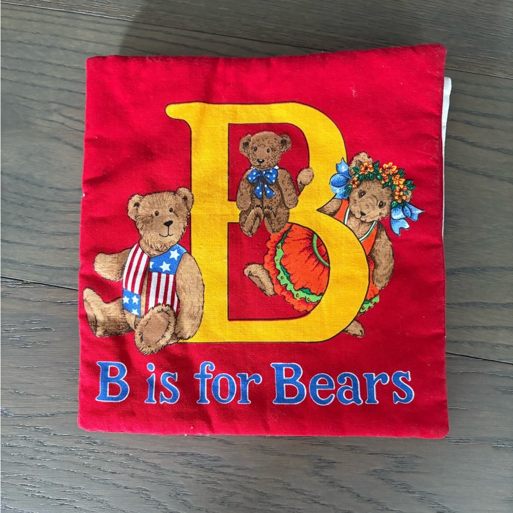 Brand new large fabric baby book 8.5” x 8.5” retail $59